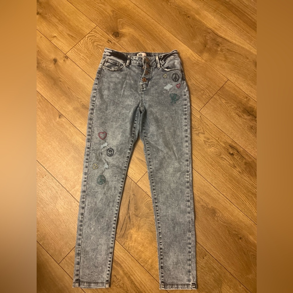 artic wash snap fly denim with distressed but no holes with fun details.